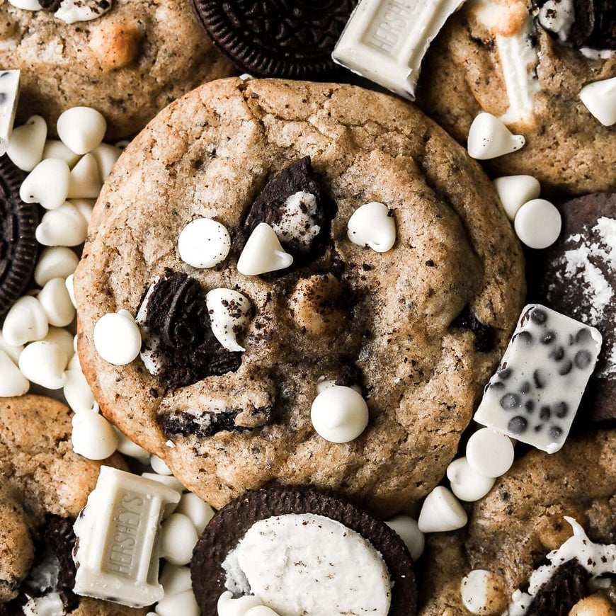 Cookies with Oreo pieces and white chocolate chips on a close-up shot